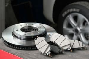 Brake pad and rotor replacement, brake repair in Kenner, LA by CAMS Automotive. Image of new brake pads and rotors, highlighting precision braking performance, enhanced safety, and reliable stopping power for your vehicle.