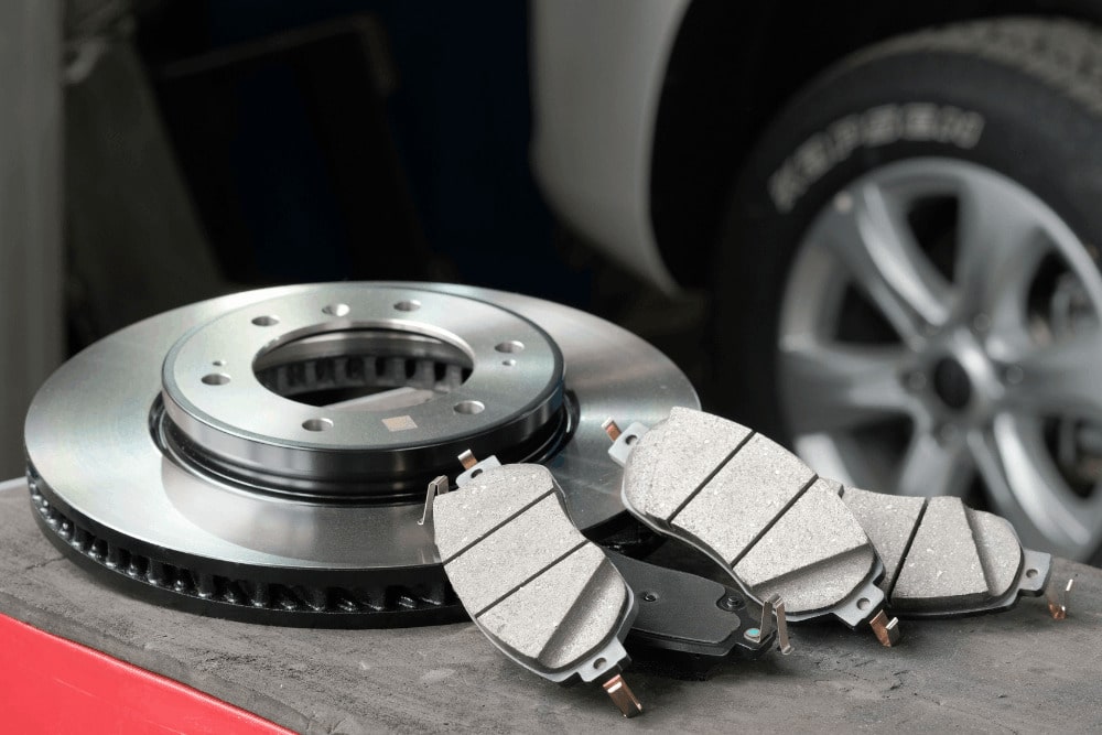 Brake pad and rotor replacement, brake repair in Kenner, LA by CAMS Automotive. Image of new brake pads and rotors, highlighting precision braking performance, enhanced safety, and reliable stopping power for your vehicle.